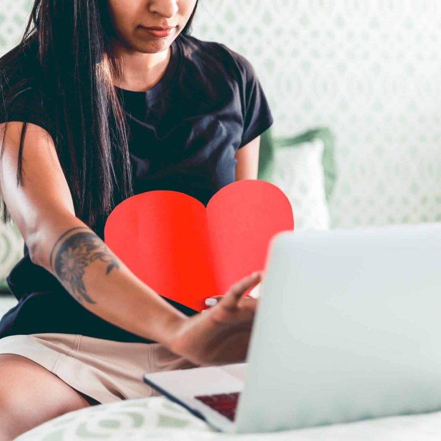 a-woman-chatting-with-lover-reaching-out-to-screen-2023-11-27-05-03-20-utc